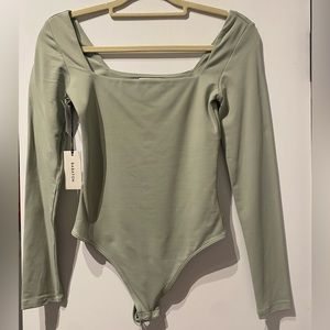 Babaton body suit NWT.